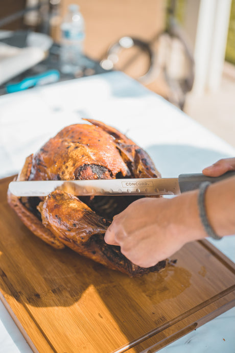 Slicing a deep fried turkey with Concord turkey slicer